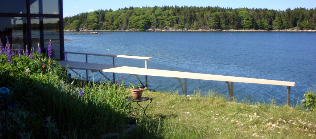 Bench by the ocean acts as a fence. Interesting bench design by Mark Pelletier